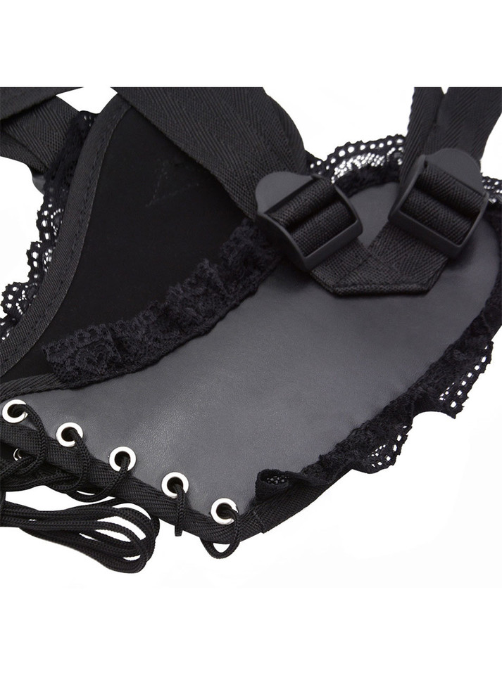 Inner view of harness with smooth lining and soft lace edge.