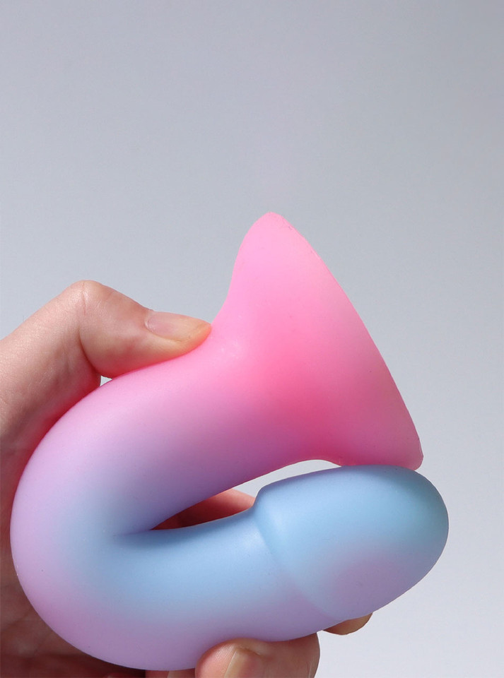 Hand bending ultra-flexible dildo in soft silicone