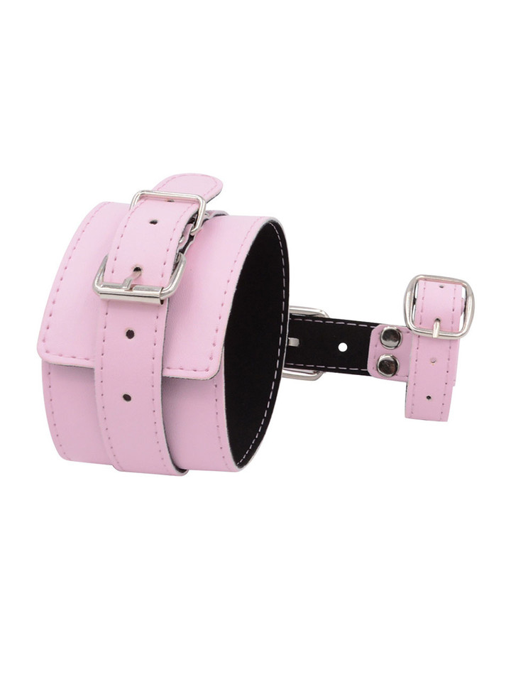 Pink bondage cuff with black lining and thumb strap