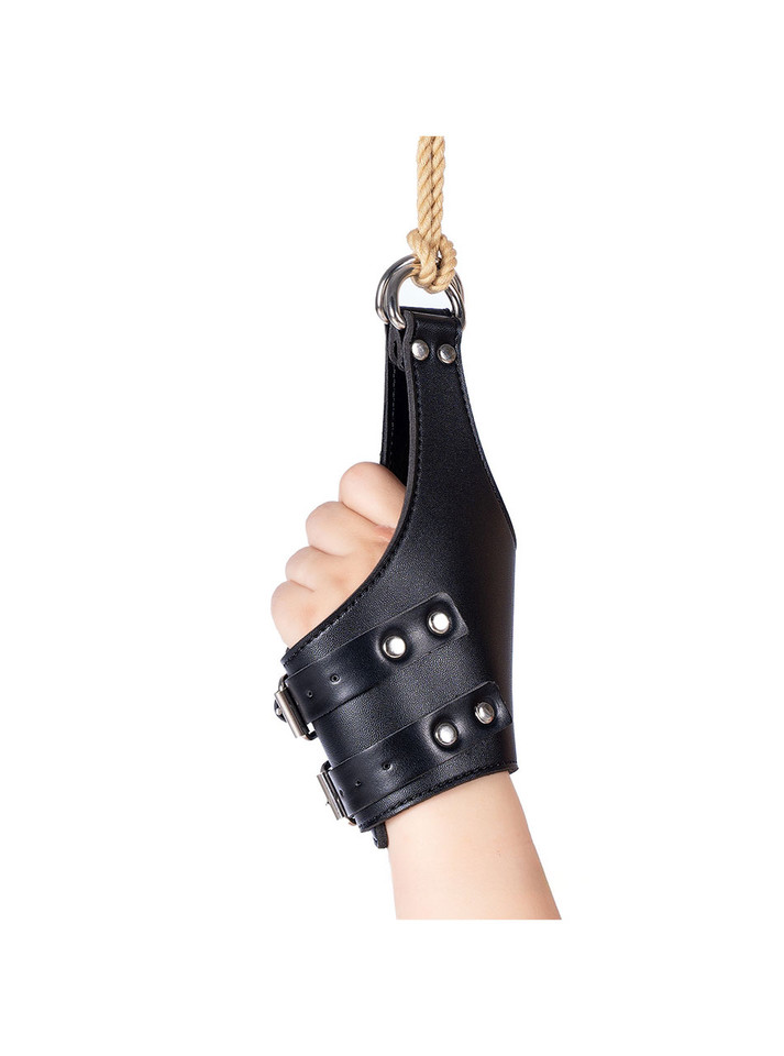 Rolled-up fist cuffs highlighting thick padding and D-ring attachment points