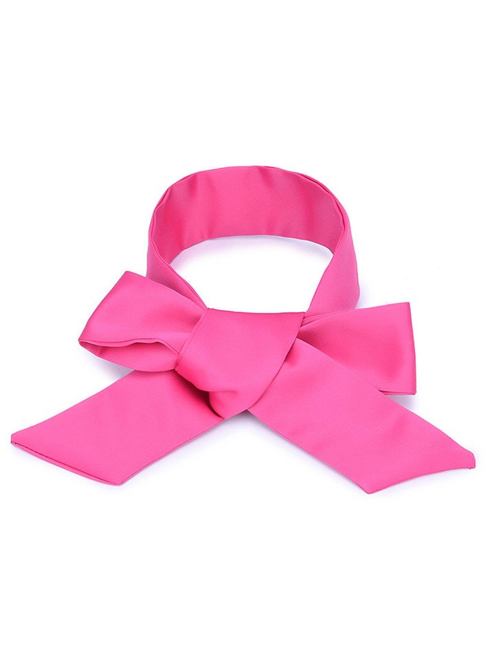 Hot pink satin ribbon blindfold tied across eyes