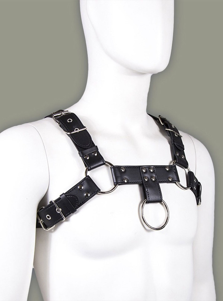 Side view of black bondage harness worn on mannequin