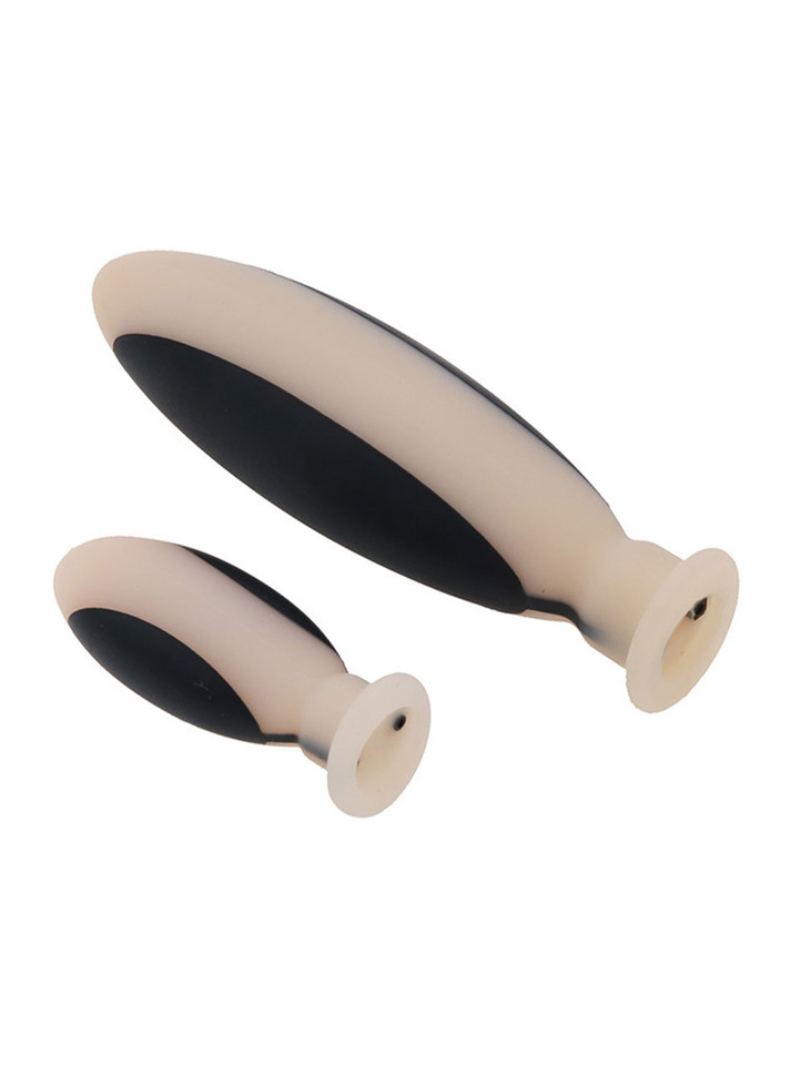 Large and small size comparison of silicone electric anal plug.