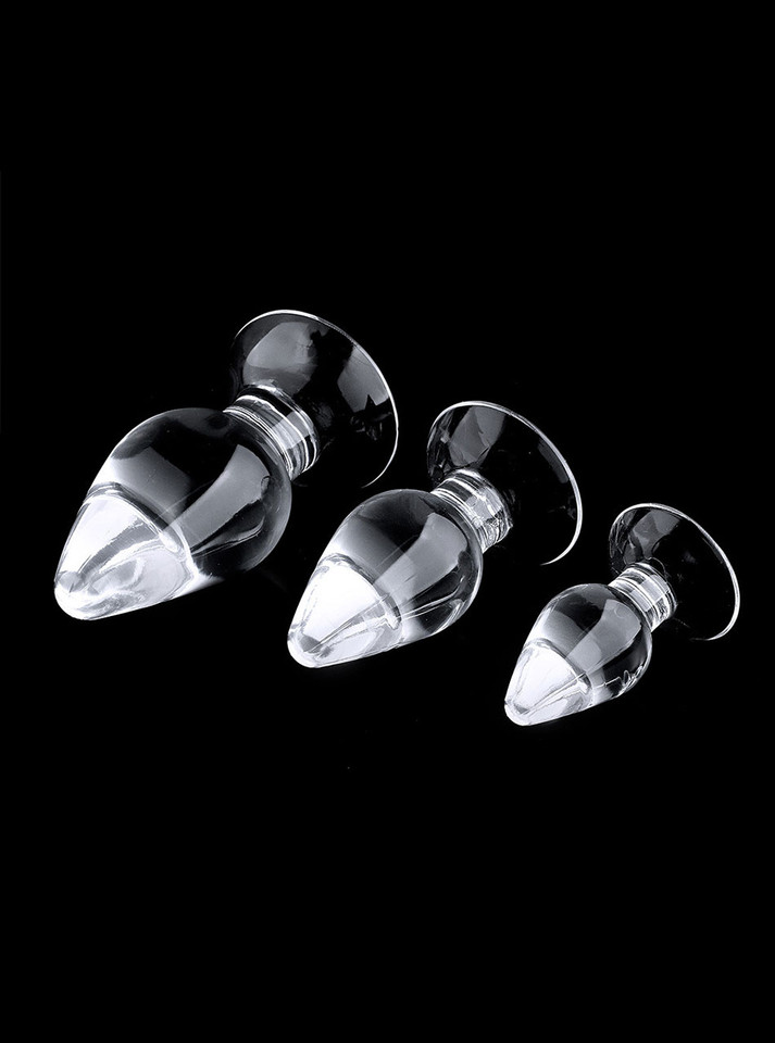 Three clear teardrop-shaped TPE plugs displayed on a black background.
