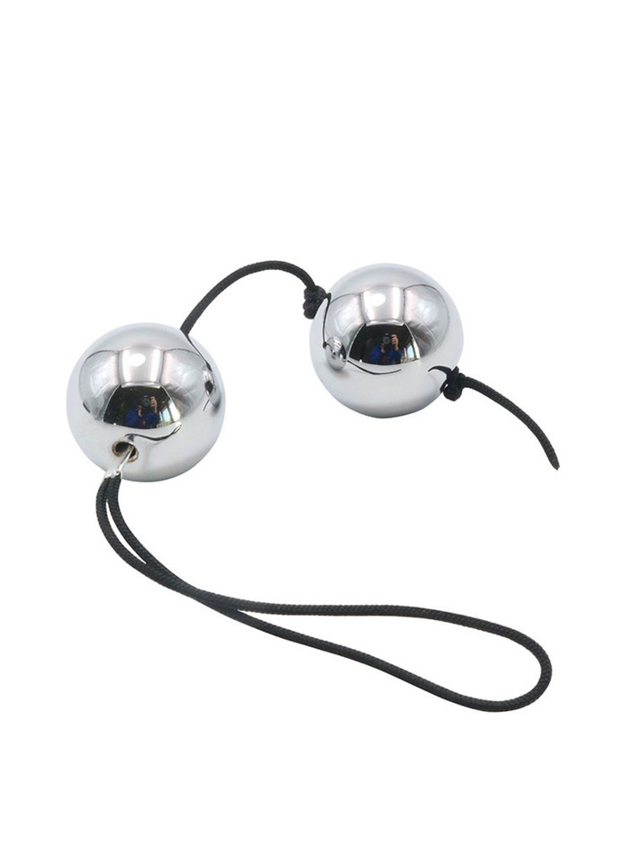 Side view of stainless steel anal beads highlighting smooth spherical shape.