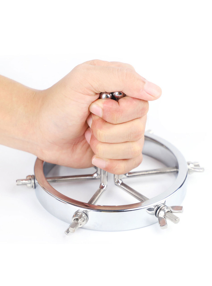 metal anal expander showing internal rod structure close up