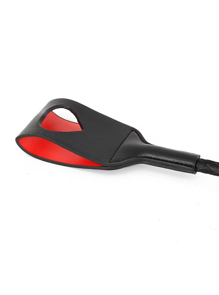 close-up of paddle tip with red inner lining and heart detail