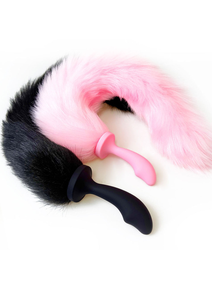 curled pink and black fox tail anal plugs