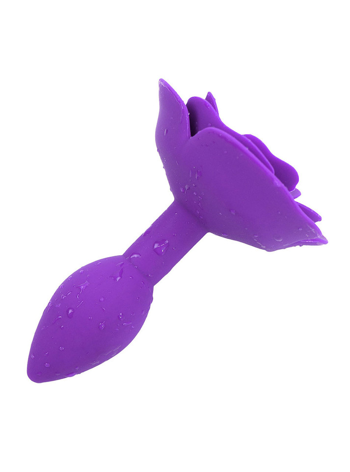Side view of purple silicone rose anal plug