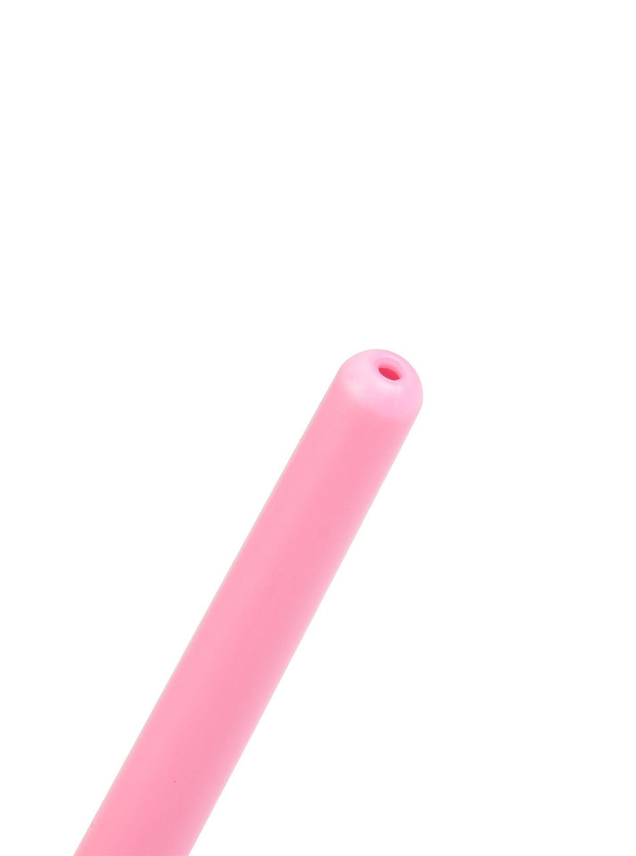 Close-up of pink ABS slim douche nozzle tip showing a single rinse opening