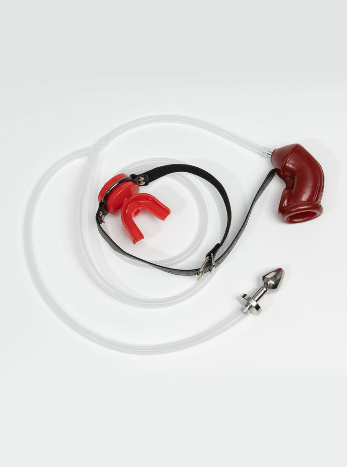 Red piss play mouth gag kit with hollow anal plug, clear tube, and red silicone sleeve