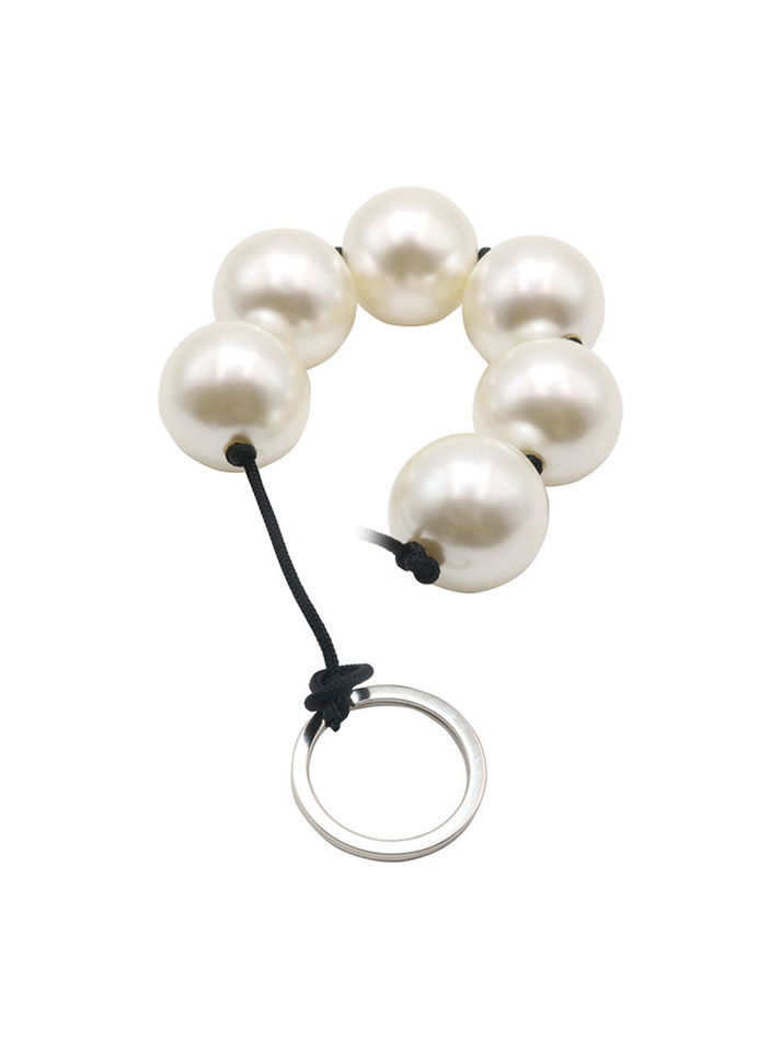 Pearl bead masturbation toy with flexible cord and retrieval ring