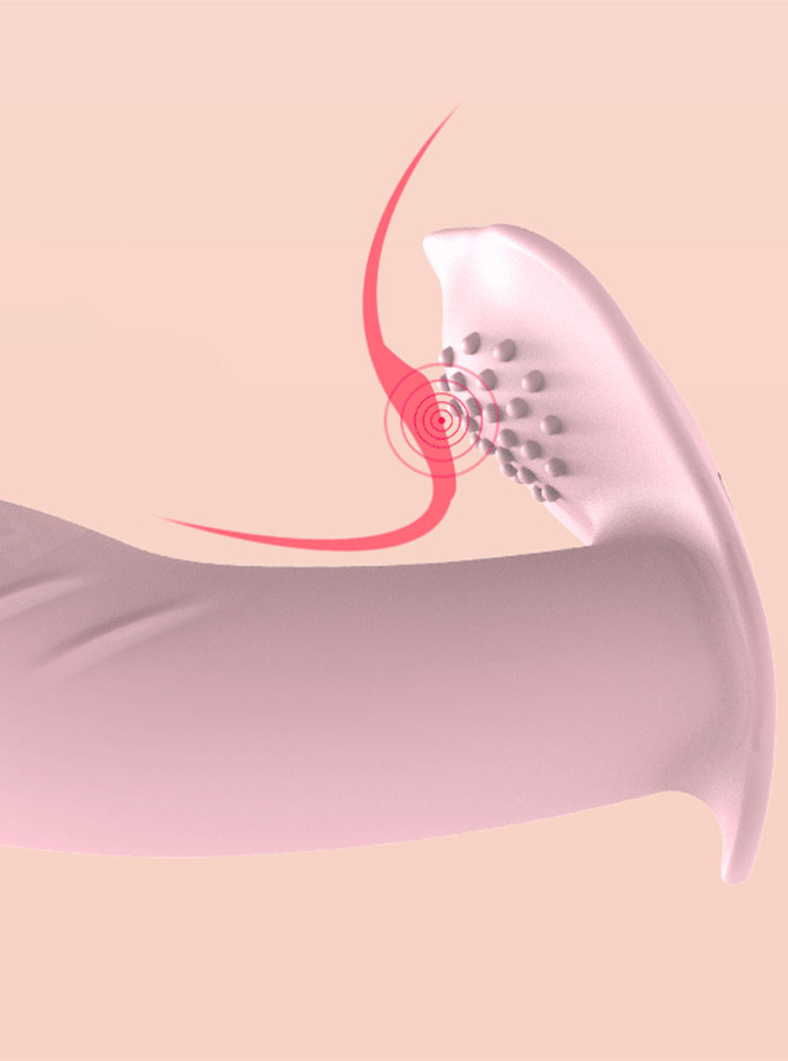 Close-up of pink wearable butterfly vibrator showing raised textured clitoral pad