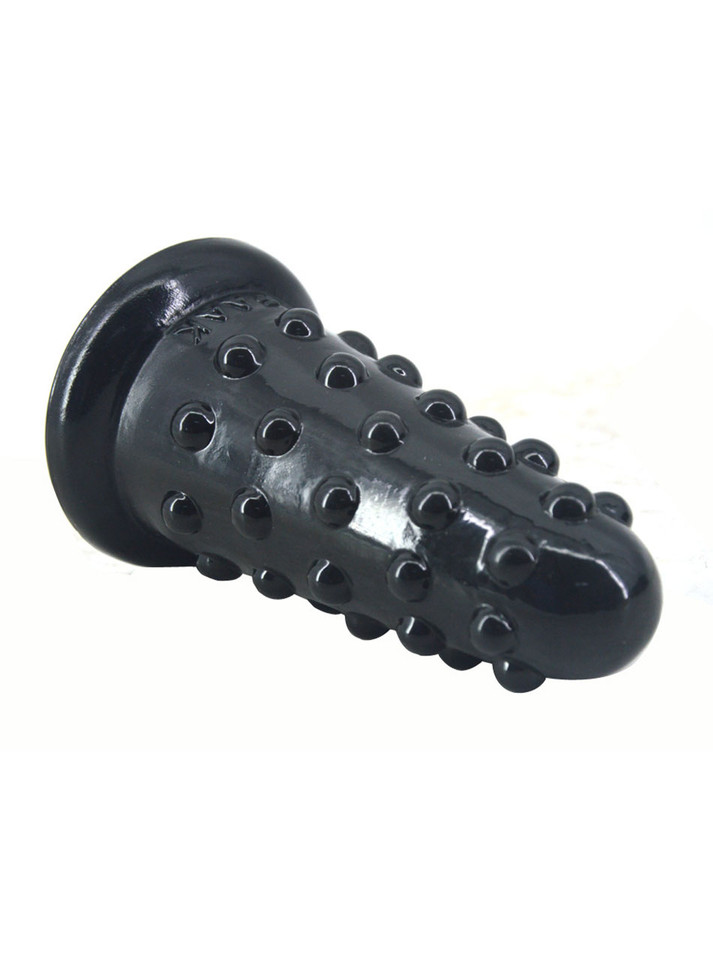 Black oversized PVC butt plug with raised dot texture and rounded tip