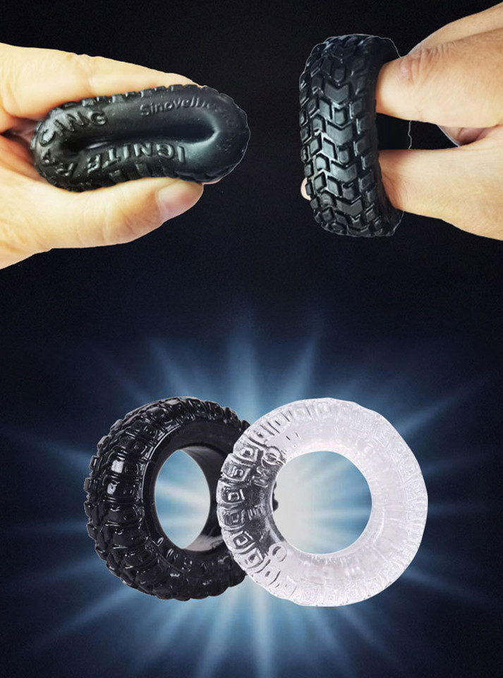Flexible black TPE Tire Ring cock ring shown bending and stretching beside the transparent version.