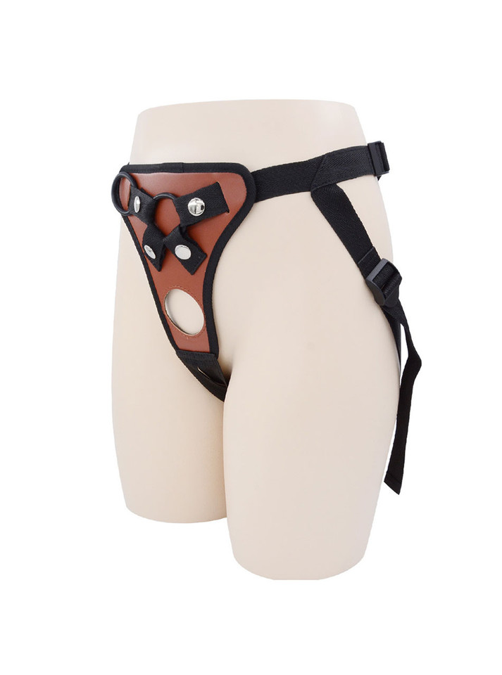 Brown faux leather strap-on harness colour option shown on mannequin with black straps and trim.