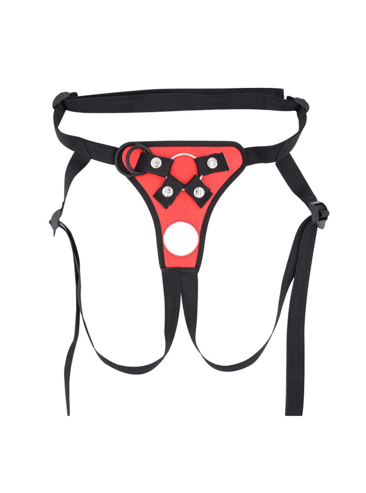 Red open back strap-on harness with adjustable straps, front rings and snap hardware.
