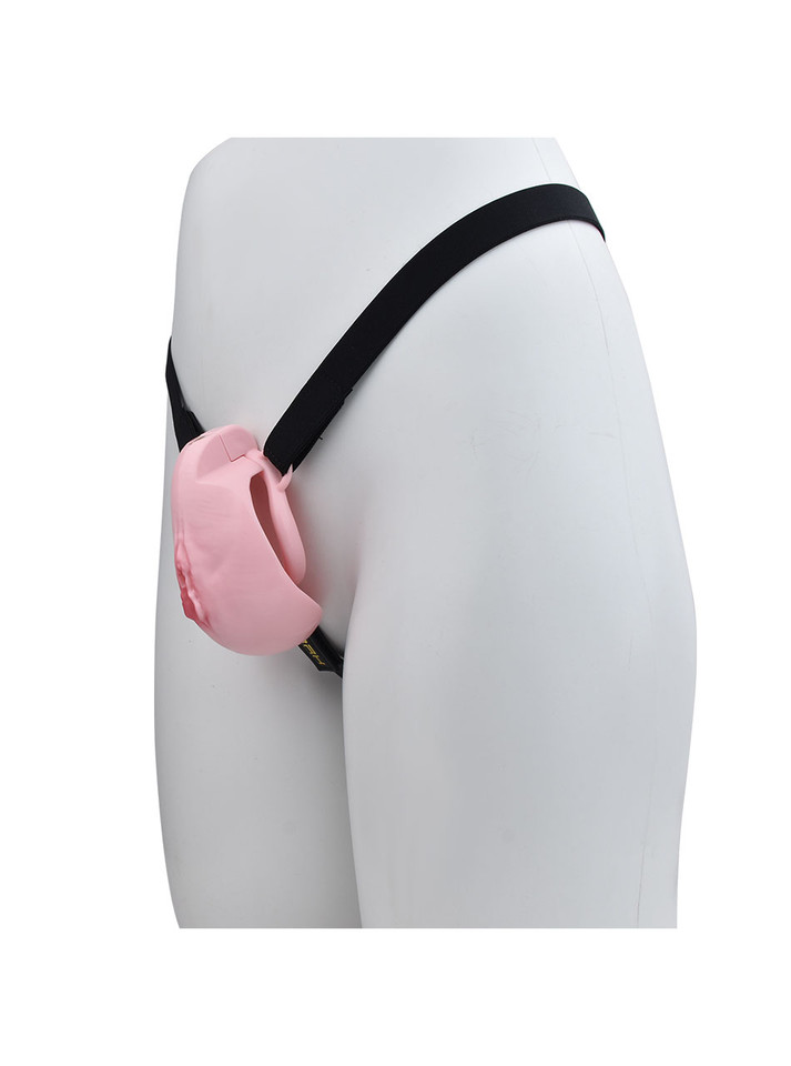 pink locking resin vagina chastity cage with black adjustable belt side view on mannequin