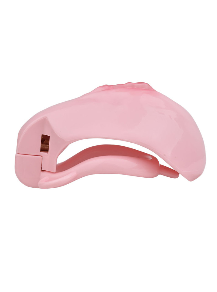 pink resin vagina chastity cage horizontal side view showing curved structure
