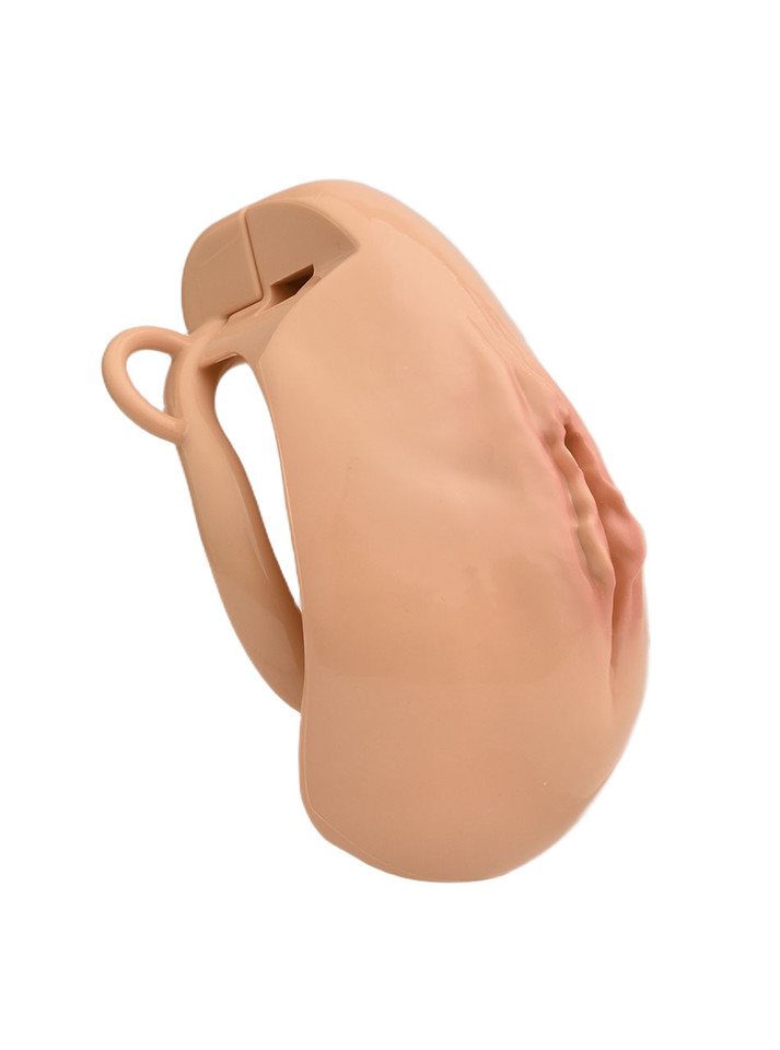 tan resin vagina chastity cage close-up side view showing realistic front detail