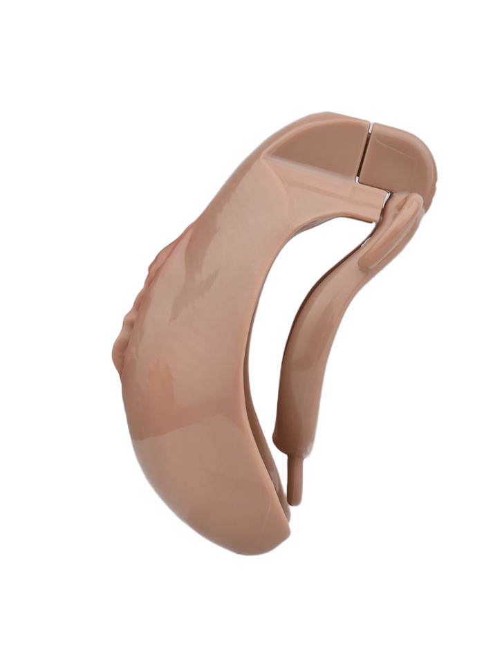 Deep Nude locking resin vagina chastity cage side profile with internal restraint section