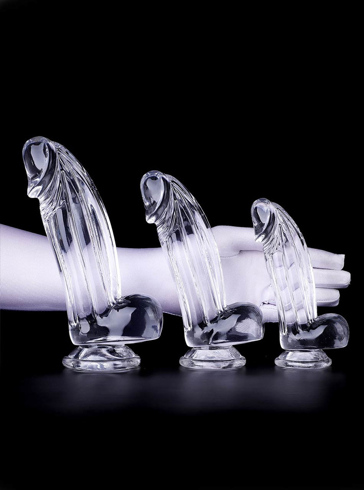 Clear realistic suction cup dildos with balls shown in Small, Medium and Large sizes