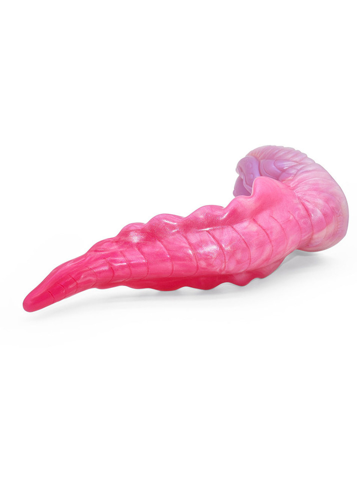 Pink and purple octopus tentacle dildo lying on its side showing ridged underside texture and tapered tip