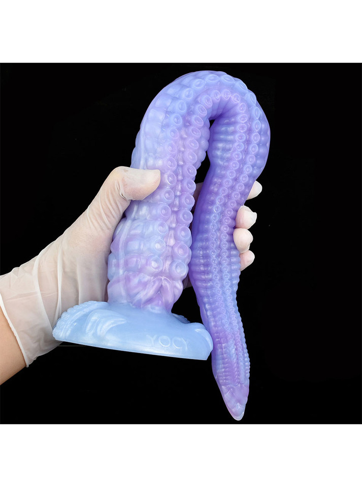 Large purple Kraken tentacle dildo bent into a loop with raised suckers visible along the shaft
