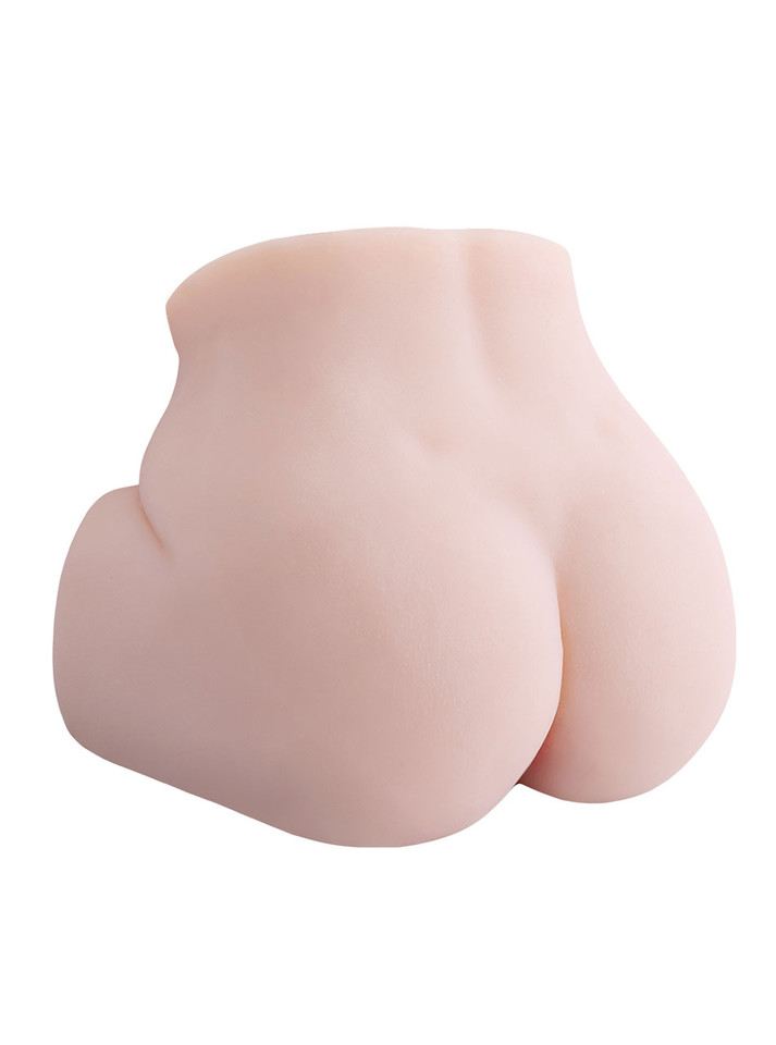 Angled rear view of Sapphire dual-hole masturbator showing her full rounded buttocks