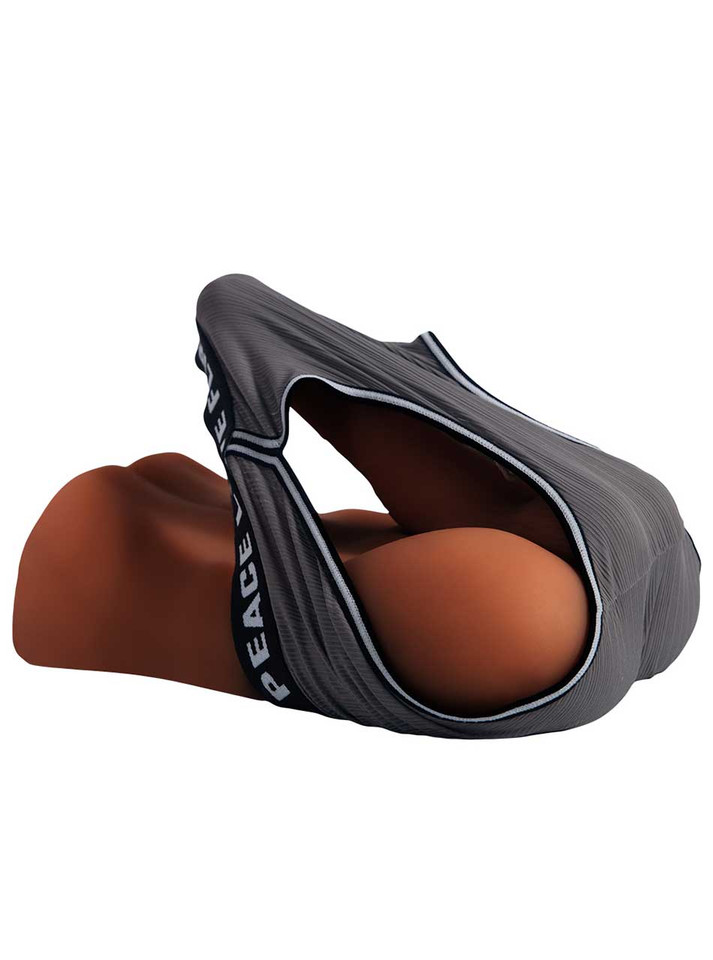 Rear view of tan male sex doll wearing black underwear over rounded ass