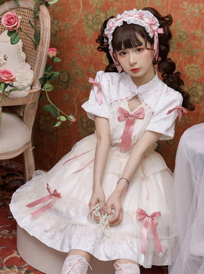 Delicate and airy chiffon princess dress adorned with cute bows, perfect for a playful and elegant look.