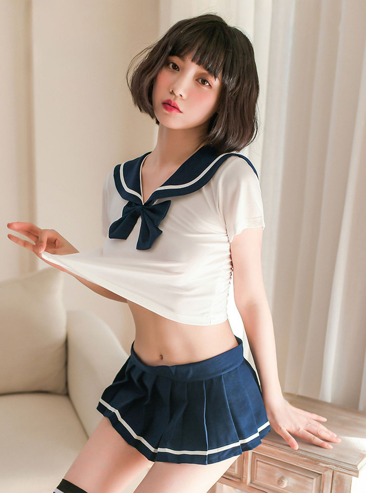 Seductive Japanese sailor-style costume with a crop top and ultra-short skirt, perfect for roleplay.