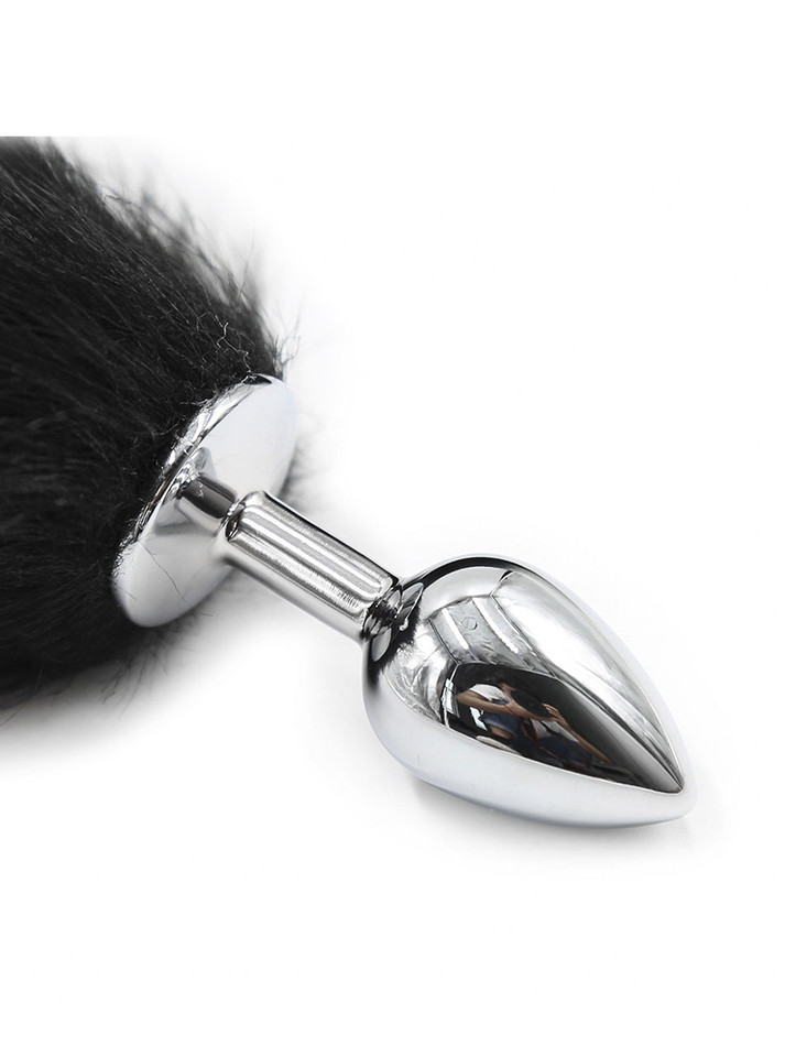 The reflective silver plug of the Midnight Whisper, promising a union of elegance and passion.