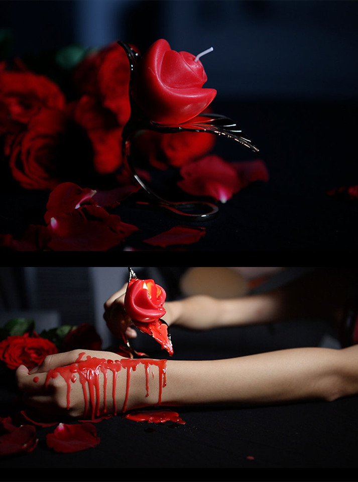 Luxurious gold leaf candle holder with a rose candle, combining classic beauty with sensual warmth.