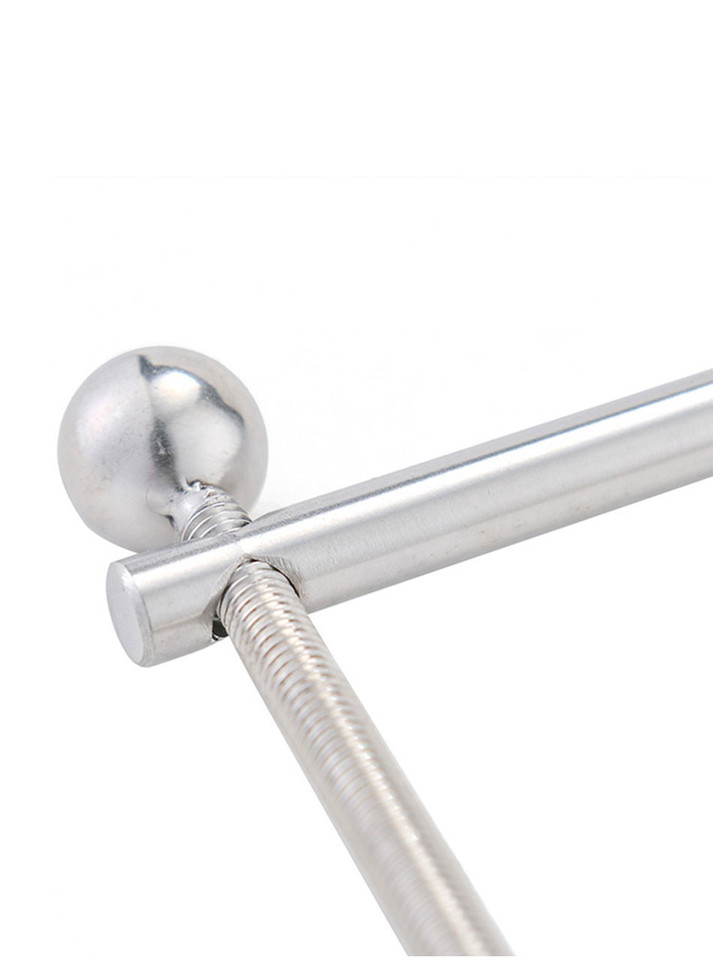 Close-up of the stainless steel chest clamp's adjustable screws and sleek surface
