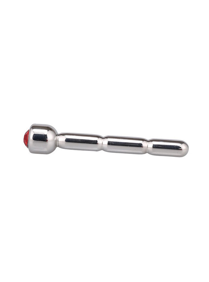 Side profile of a stainless steel penis plug showing off its refined shape and gem accent.