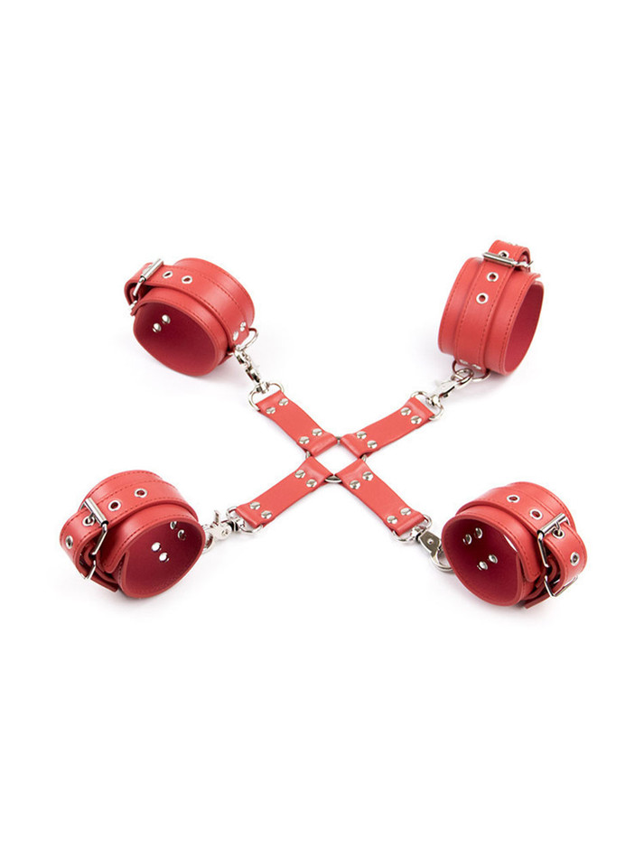 Versatile red vegan leather cross tie restraint system with adjustable straps.