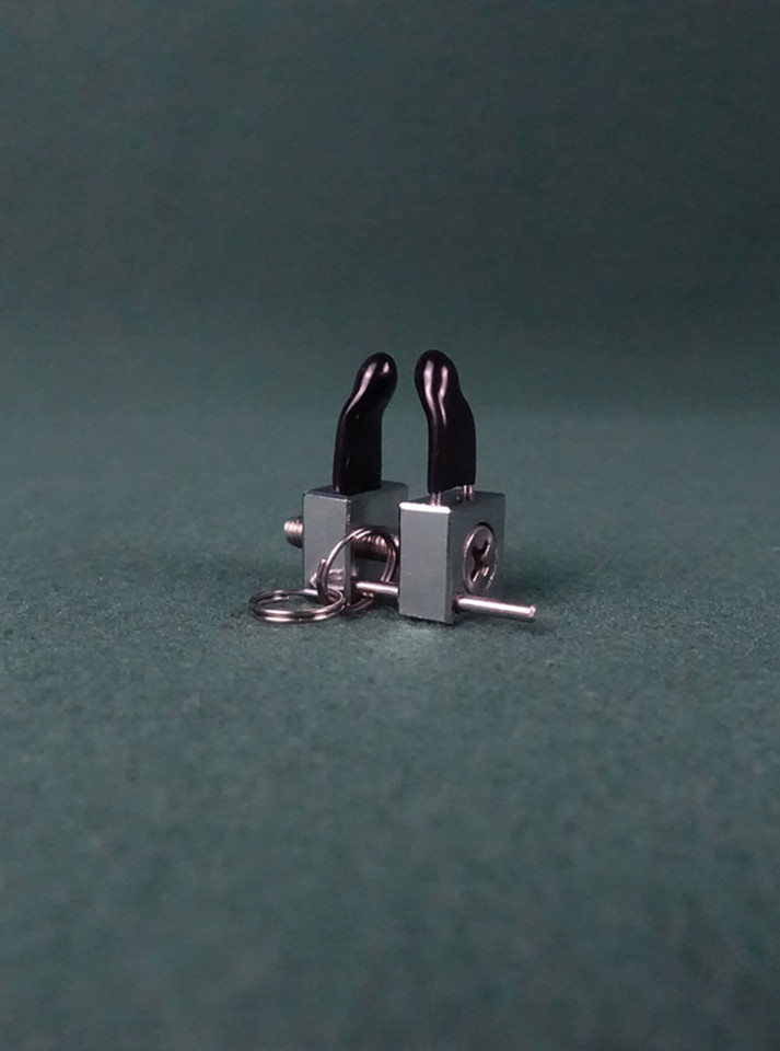 Detail of The Lollipop Nose Clamp's adjustable feature, perfect for a tailored fit