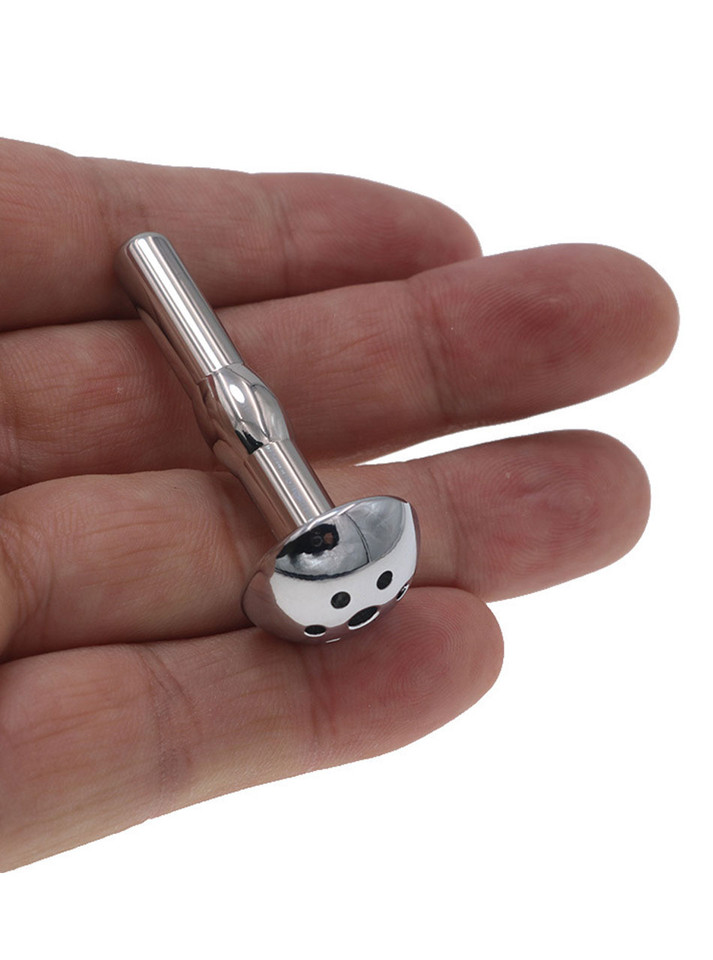 Full view of The Golden Shower Head Penis Plug, showcasing its multifunctionality as both a urethral toy and a watersport accessory.
