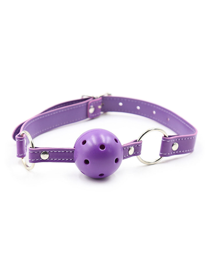 Purple Breathable Ball Gag: Close-up of the purple ball gag with breathable holes and adjustable vegan leather strap.