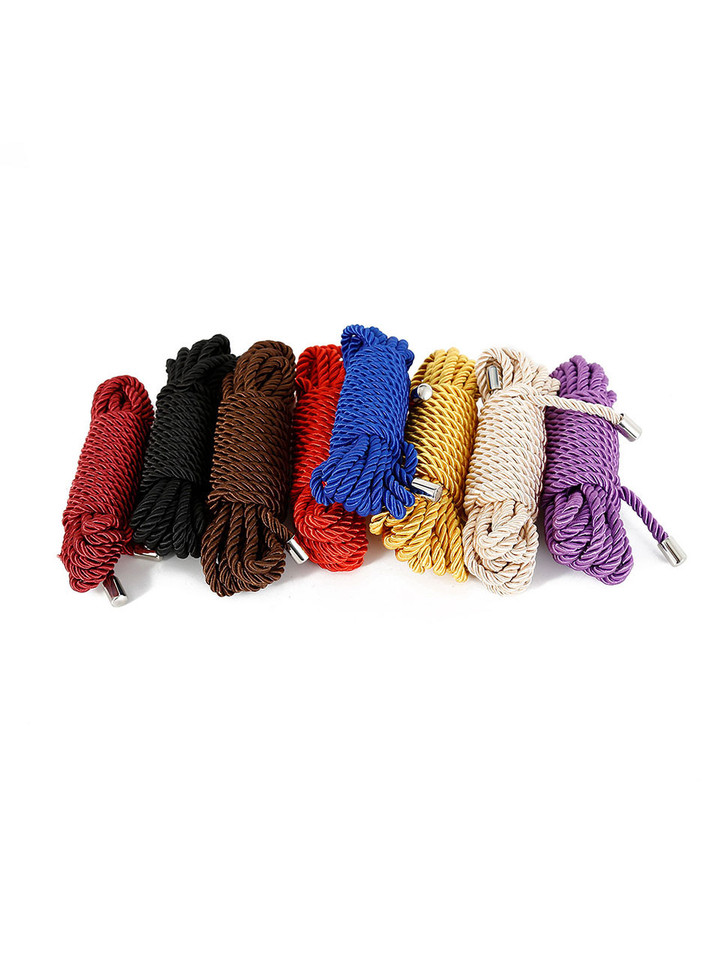 A selection of colorful Silk Polyester Bondage Ropes, neatly coiled and ready for use.