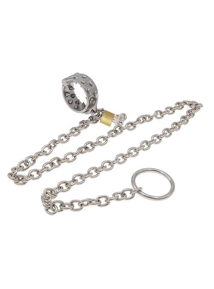 Stainless steel ball stretcher with sharp spikes, secured with lock and chain.