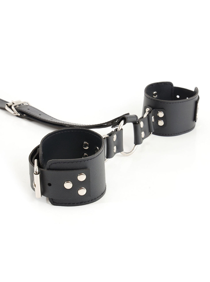 Close-up view of the leather wrist cuffs and straps