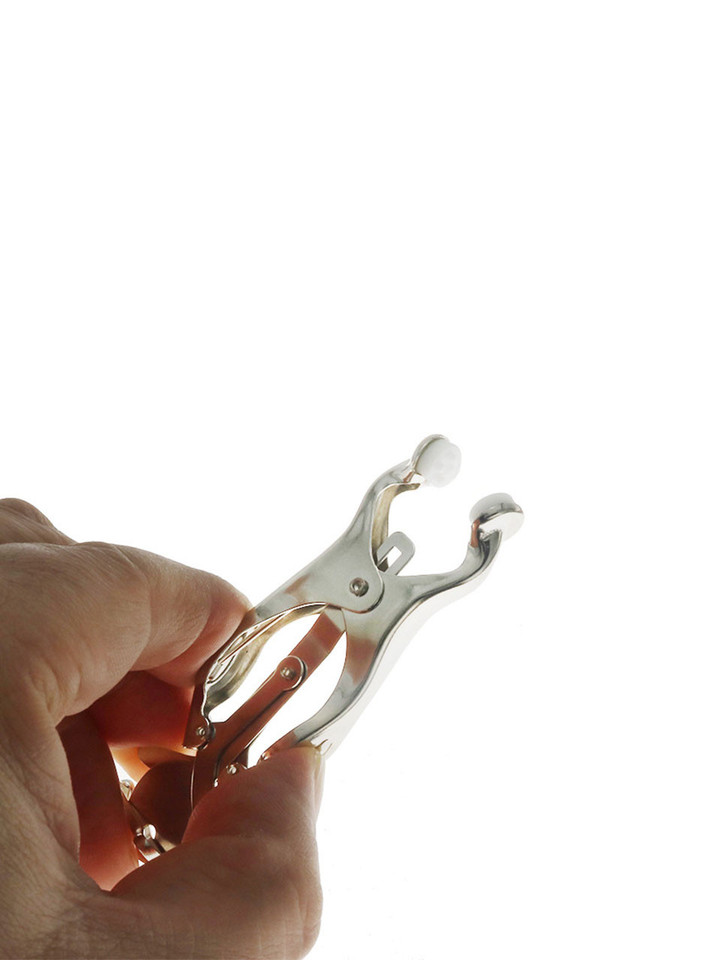 Close-up of durable stainless steel clover clamps featuring heavy weighted balls, ideal for delivering consistent pressure on sensitive areas.