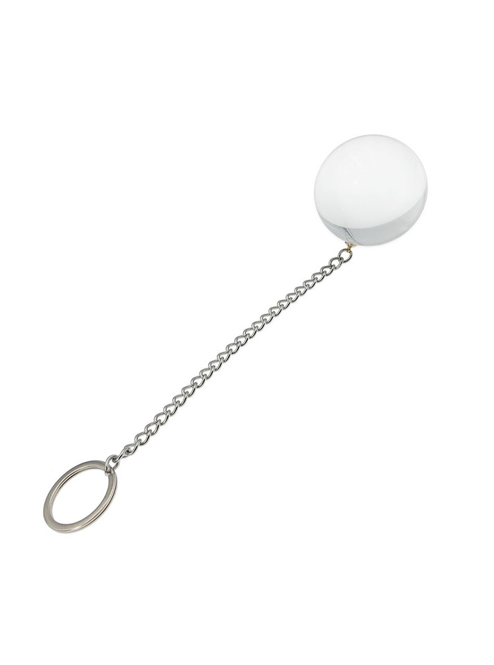Solid glass anal ball with chain, showcasing its size and weight, ready for advanced play.
