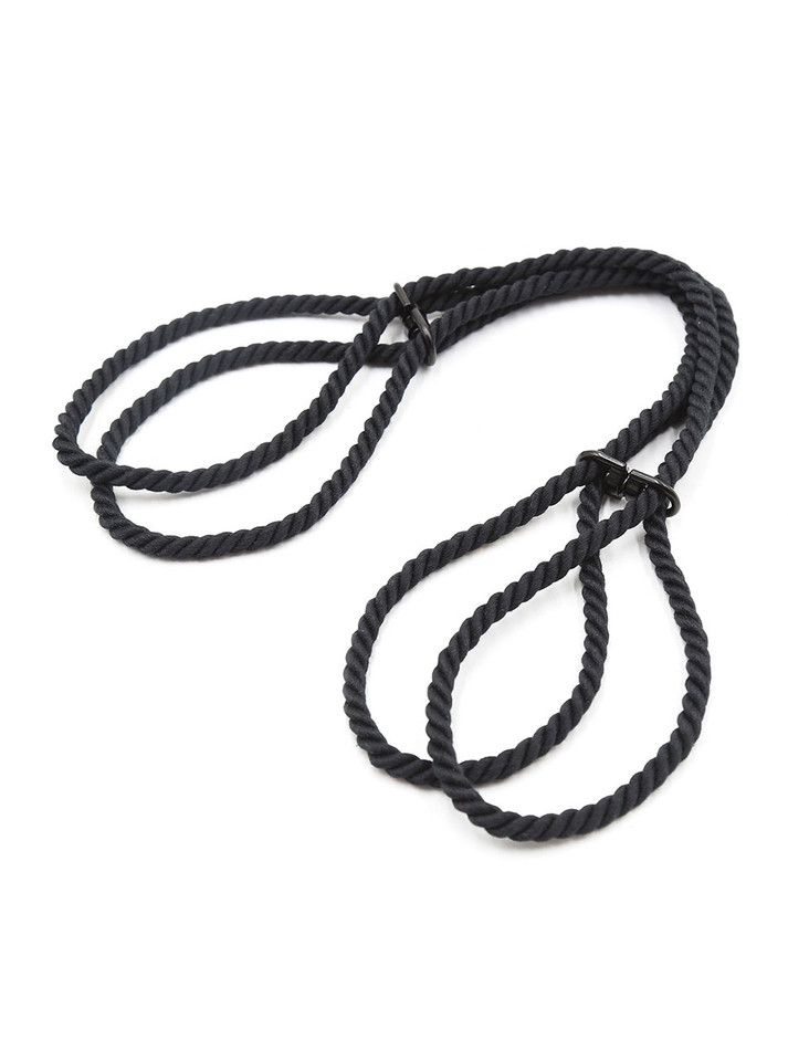 Black Shibari-inspired adjustable rope cuffs with loops and fasteners.