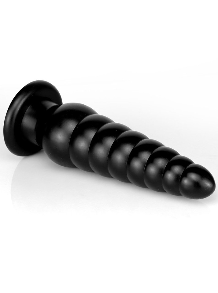 Close-up of the suction base on the ribbed PVC plug for stability during use.
