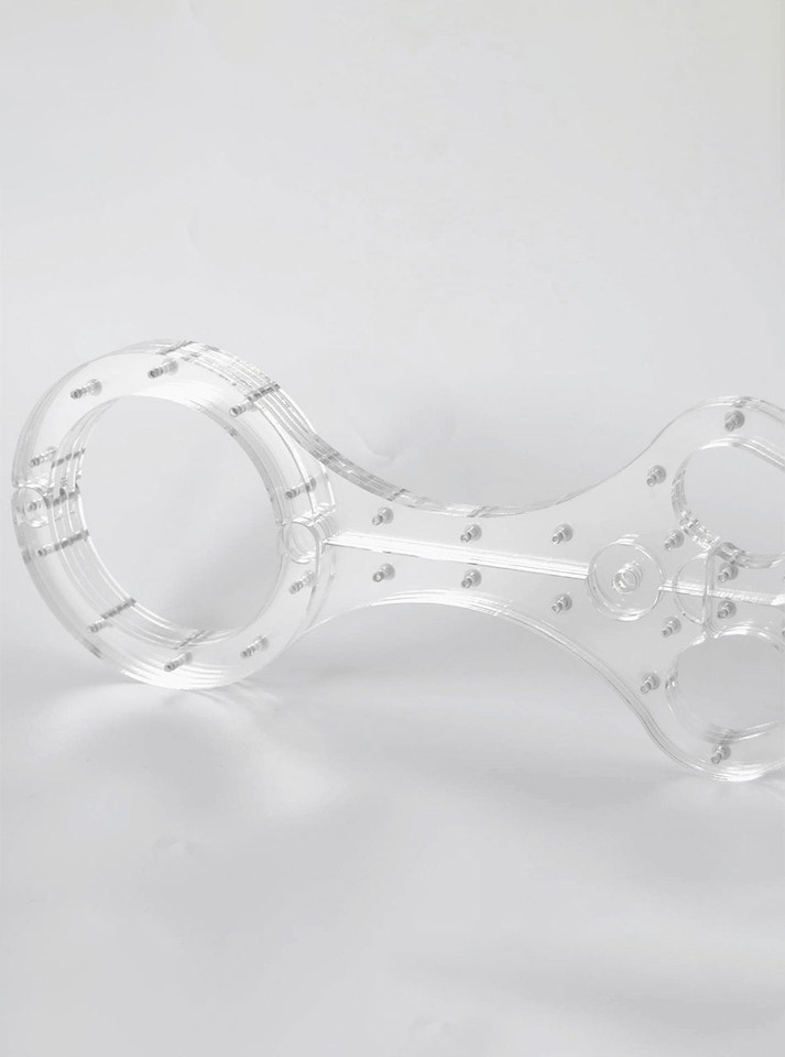 Side view of the Lockable Clear Crystal Cangue, highlighting its clear acrylic construction.