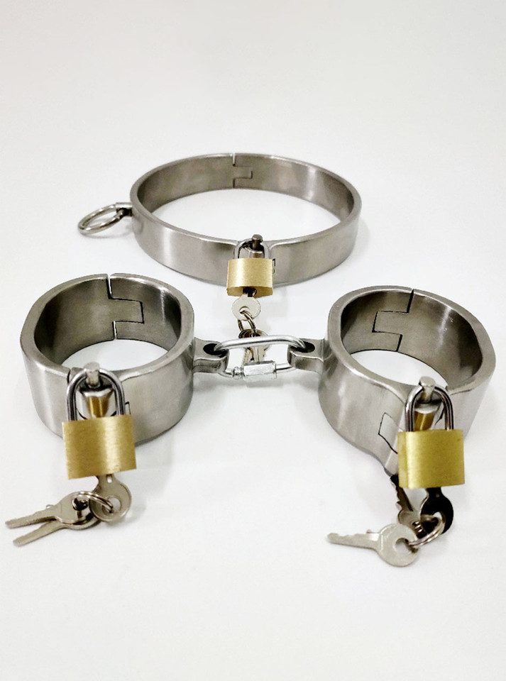 Stainless steel handcuffs and leg irons in locking restraint set with keys.