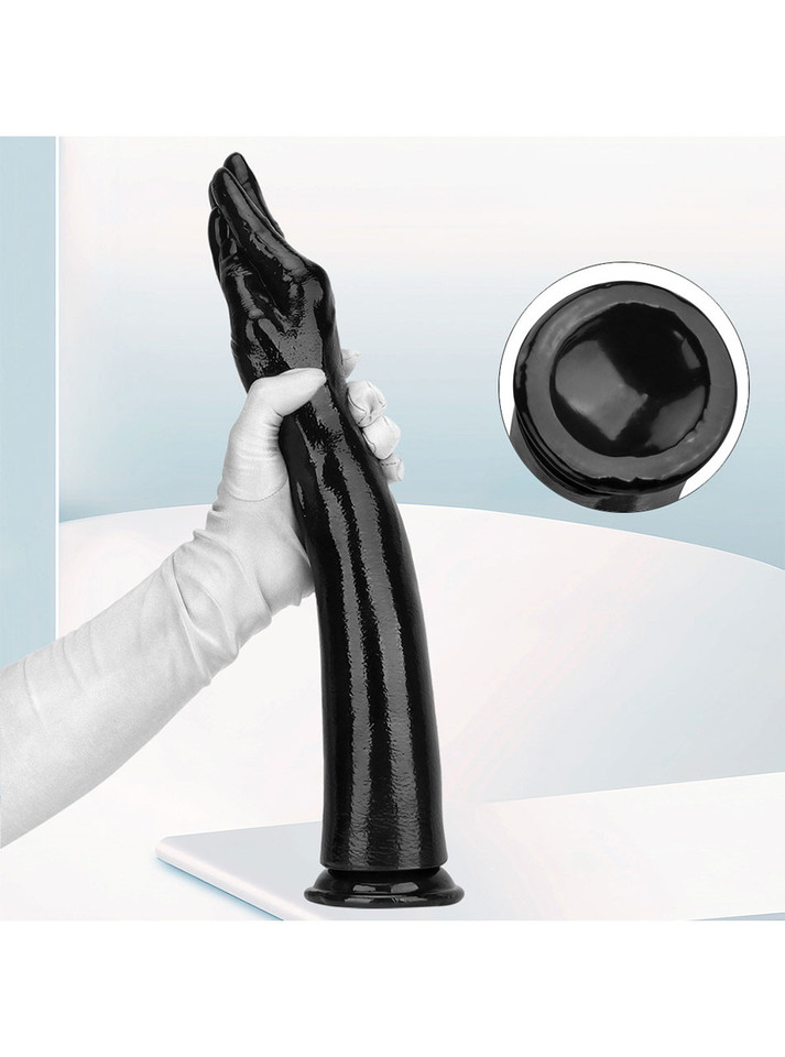 Close-up of the suction cup base on the black forearm dildo, ensuring stability and versatility.